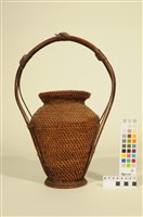 藏品(帶把籐籃)的圖片